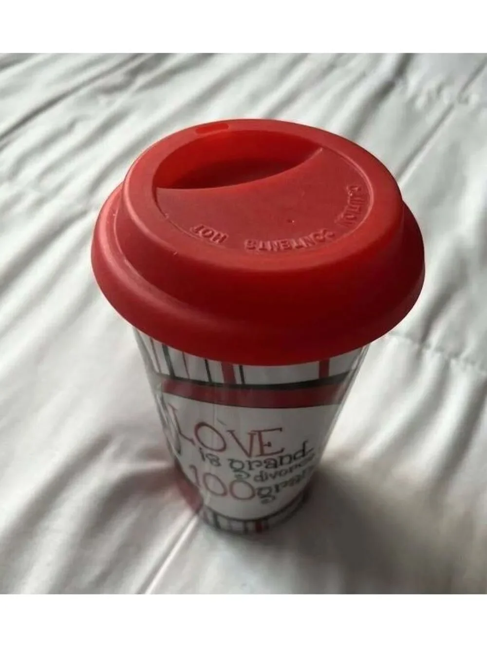 DRINKWARE Ceramic Travel Coffee Mug with Red Silicone Lid and Artistic Design